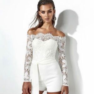 White romper.  Size Small.   back zip.  Never worn